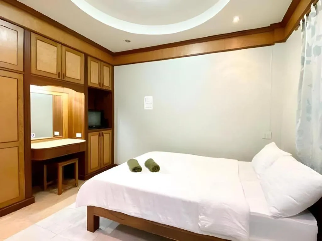 Bed in Phuphan Park Hotel