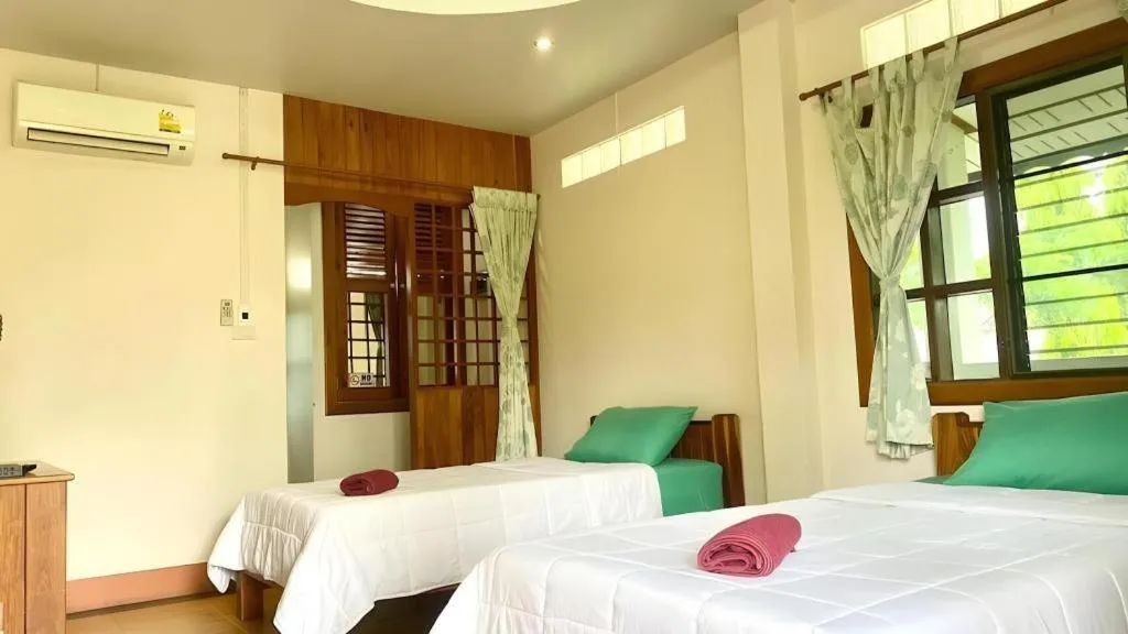 Bed in Phuphan Park Hotel