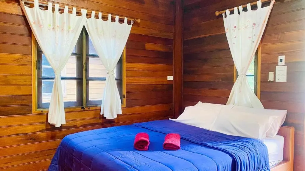 Bed in Phuphan Park Hotel