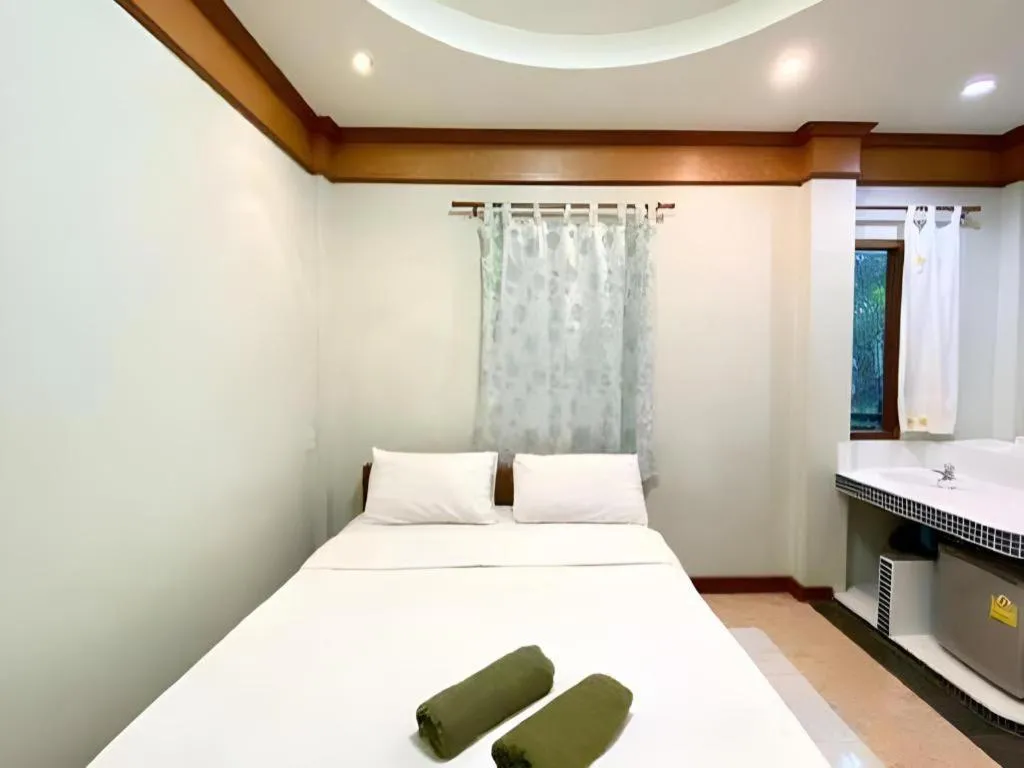 Bed in Phuphan Park Hotel