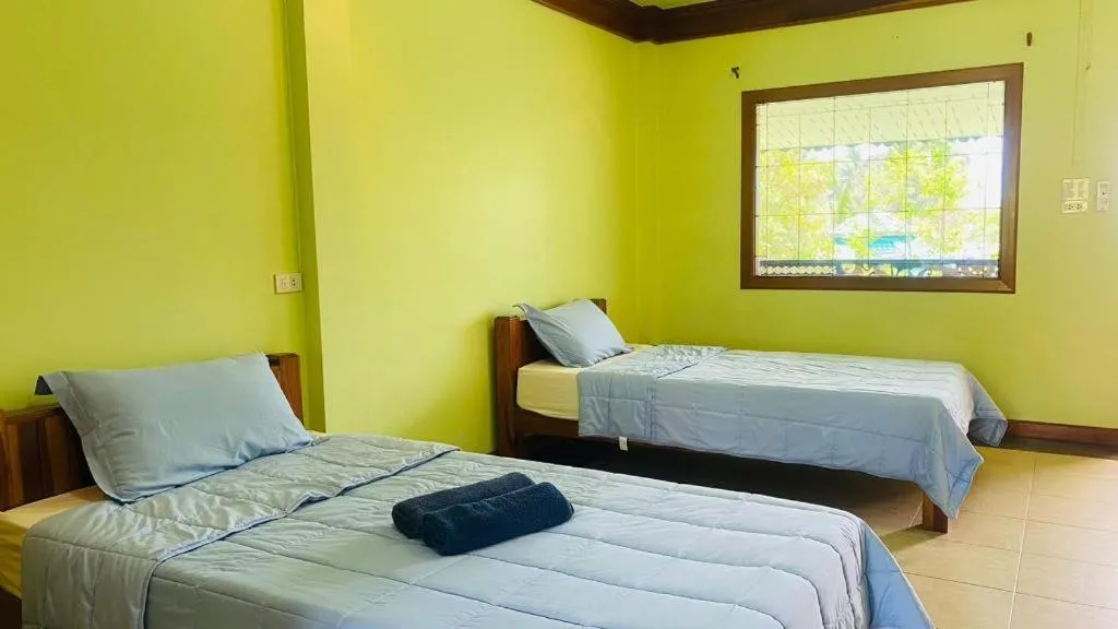 Bed in Phuphan Park Hotel