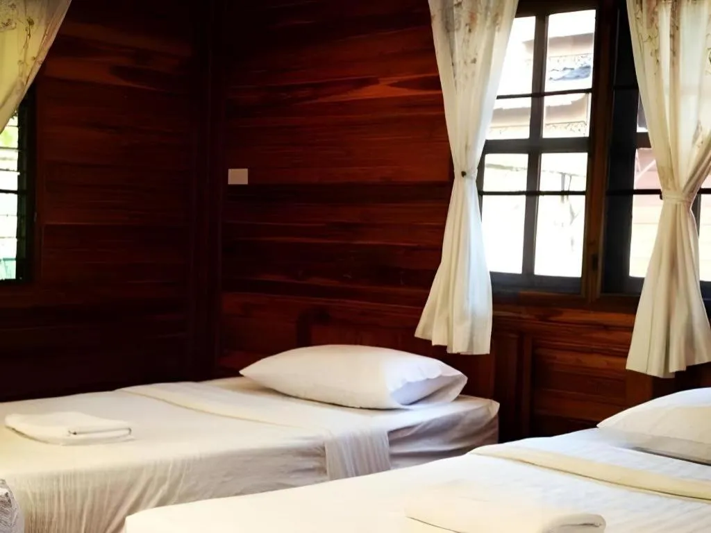 Bed in Phuphan Park Hotel