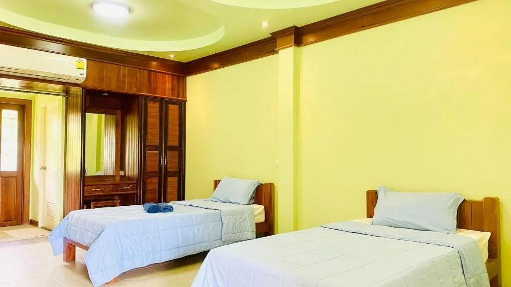 Bed in Phuphan Park Hotel