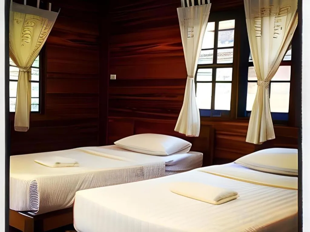 Bed in Phuphan Park Hotel