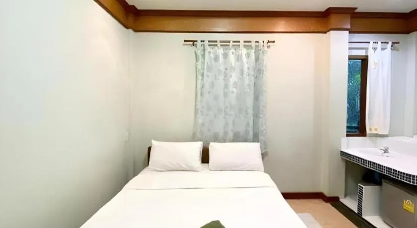 Bed in Phuphan Park Hotel