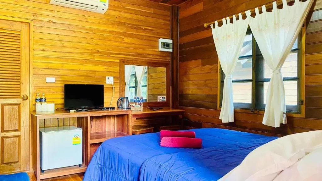 Bed in Phuphan Park Hotel