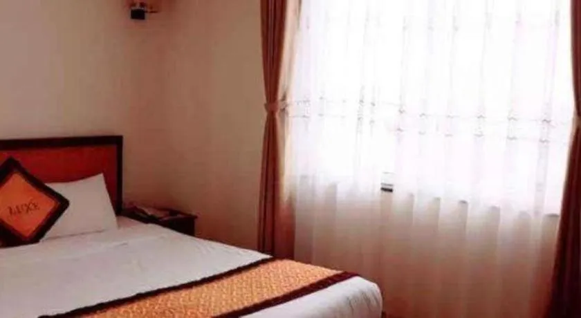 Bed in Luxe Hotel