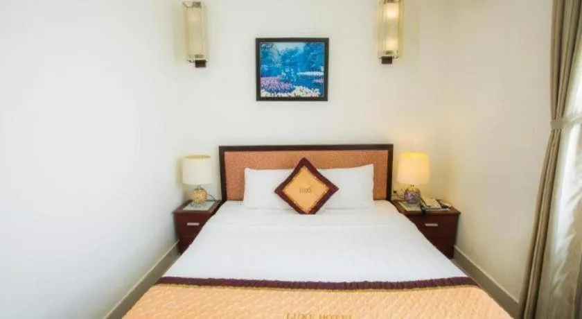 Bed in Luxe Hotel