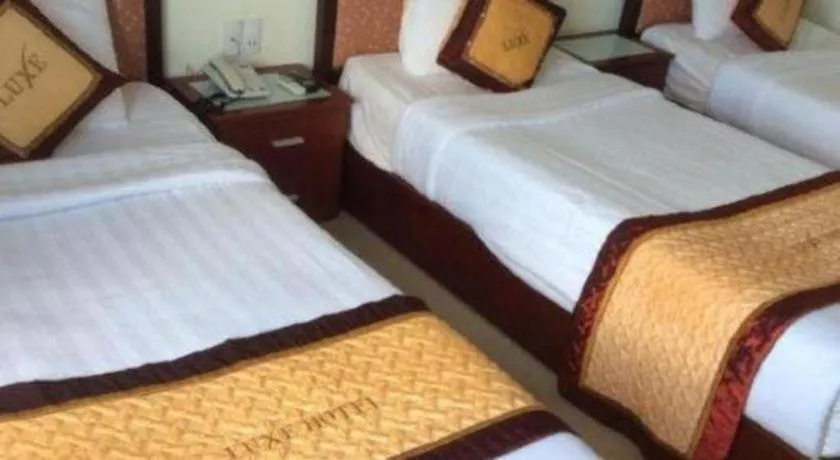 Bed in Luxe Hotel
