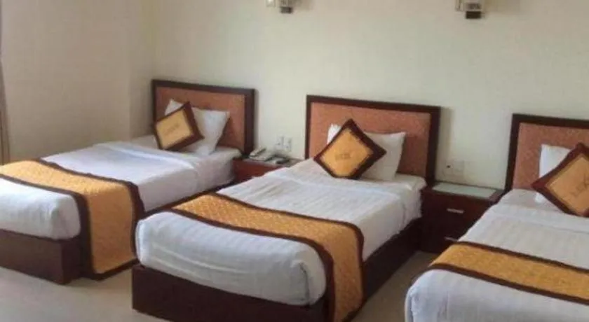 Bed in Luxe Hotel