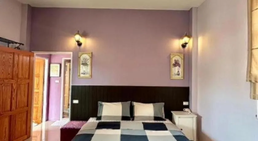 Bed in The Color Resort Amphawa