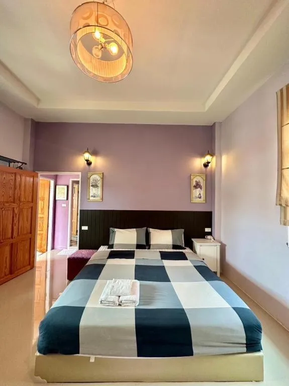 Bed in The Color Resort Amphawa