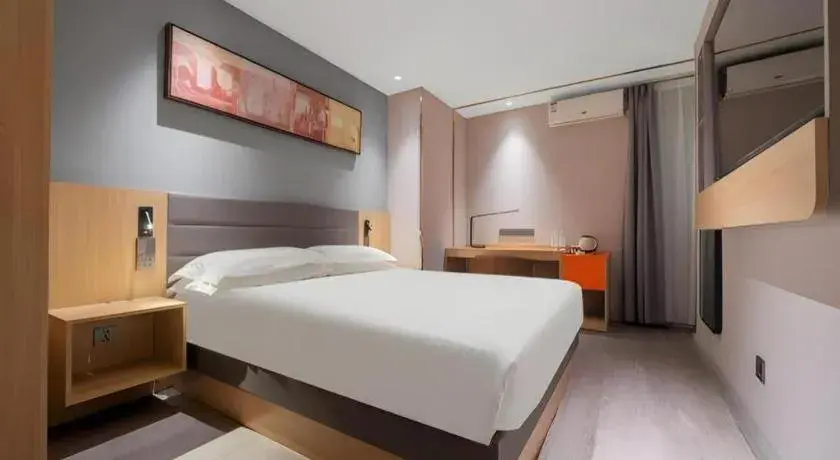 Bed in Jinjiang Inn Quanzhou West Street Kaiyuan Temple Bed in Jinjiang Inn Quanzhou West Street Kaiyuan Temple