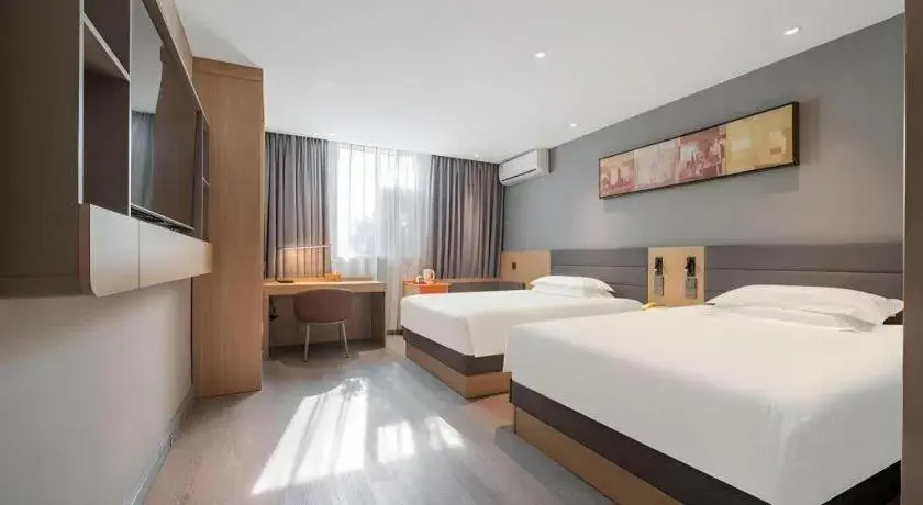 Bed in Jinjiang Inn Quanzhou West Street Kaiyuan Temple Bed in Jinjiang Inn Quanzhou West Street Kaiyuan Temple