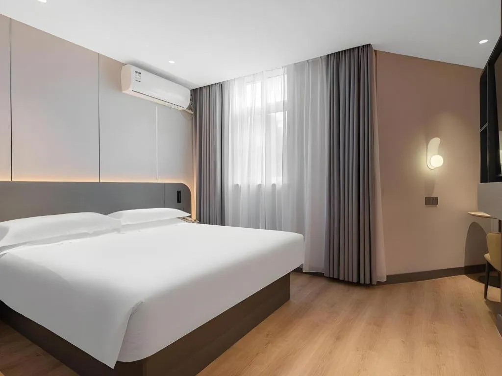 Bed in Jinjiang Inn Quanzhou West Street Kaiyuan Temple