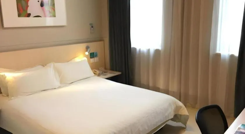 Bed in Jinjiang Inn Cixi Intime City Shanglinfang Pedestrian Street