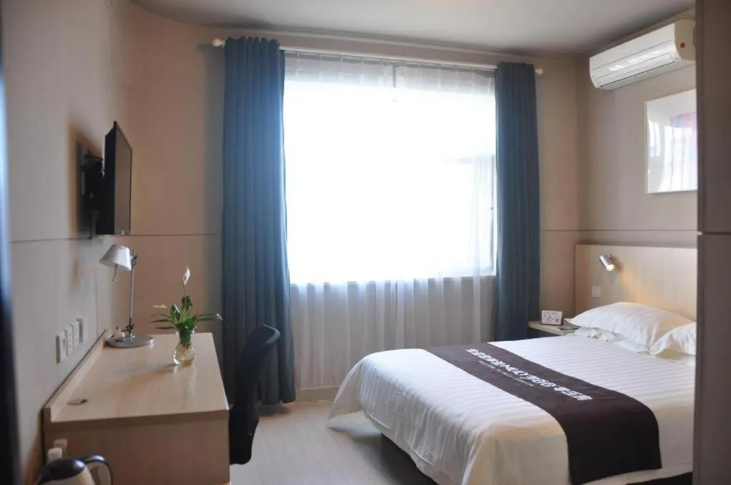 Bed in Jinjiang Inn Cixi Intime City Shanglinfang Pedestrian Street