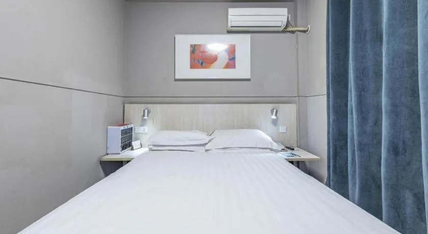 Bed in Jinjiang Inn Cixi Intime City Shanglinfang Pedestrian Street