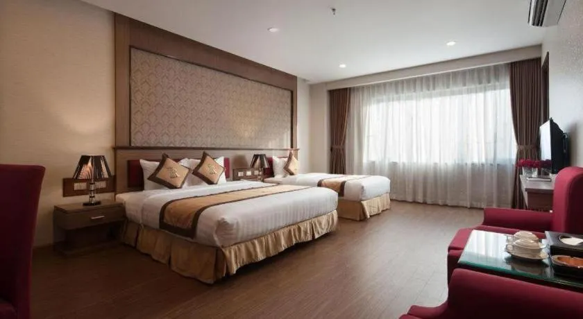 Bed in Royal Palace Hotel