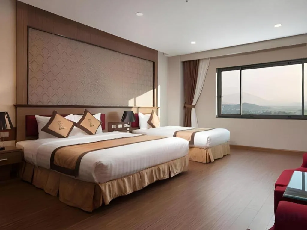 Bed in Royal Palace Hotel