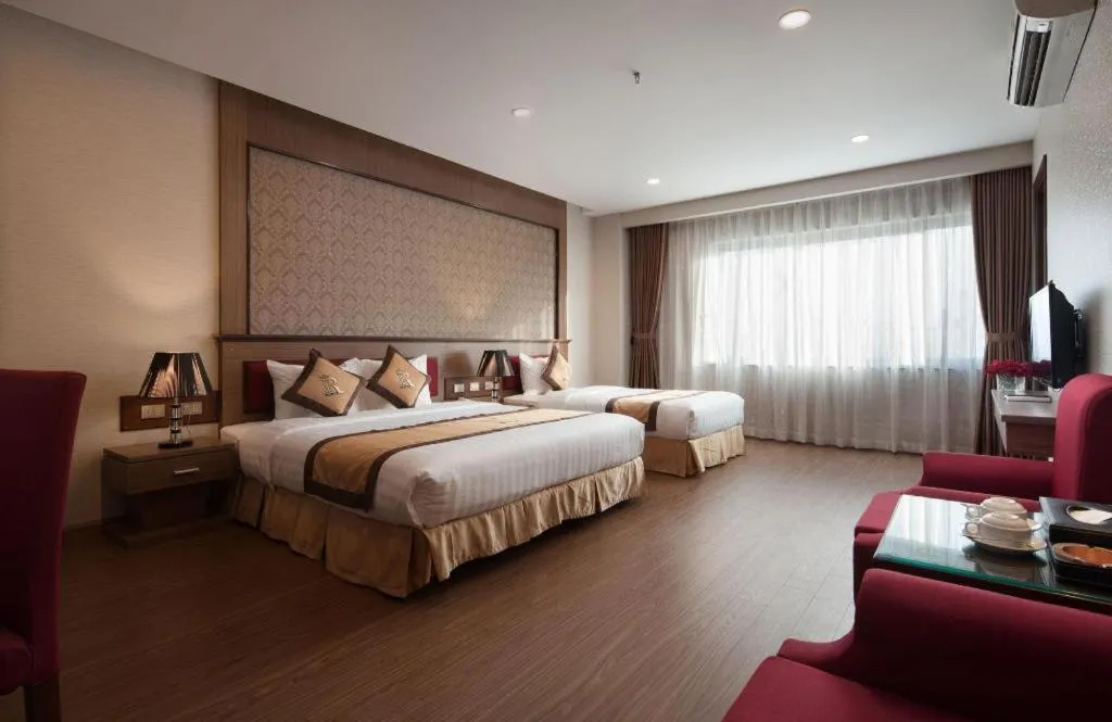 Bed in Royal Palace Hotel