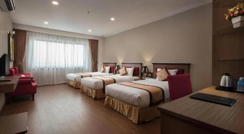 Bed in Royal Palace Hotel