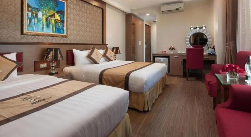 Bed in Royal Palace Hotel