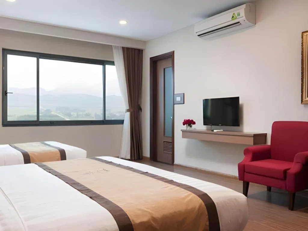 Bed in Royal Palace Hotel