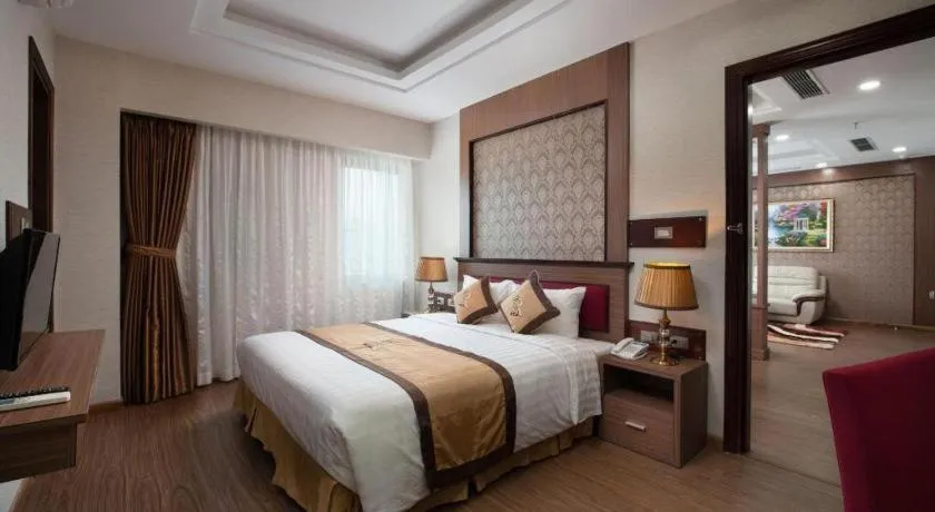 Bed in Royal Palace Hotel