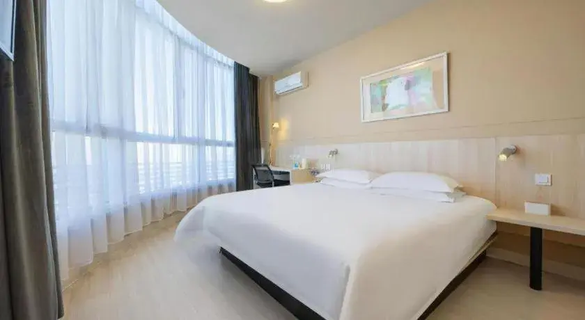 Bed in JinJiang Inn Datong Pingchengqiao Bed in JinJiang Inn Datong Pingchengqiao