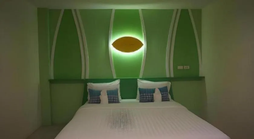 Bed in The Rice Hotel