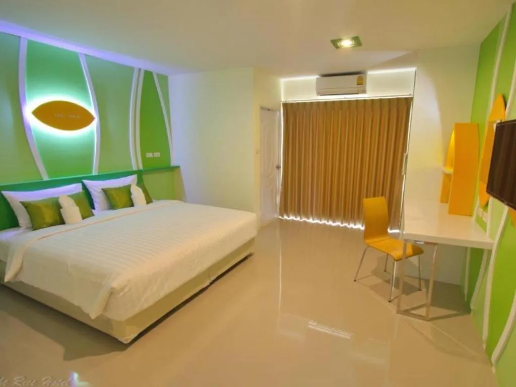 Bed in The Rice Hotel