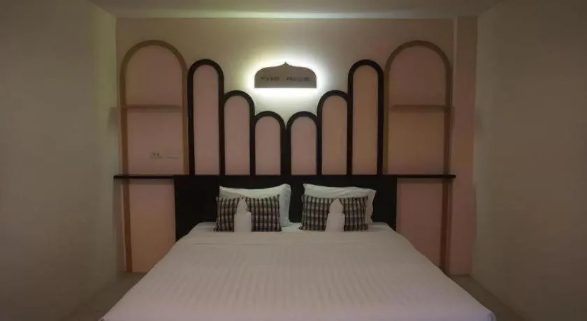 Bed in The Rice Hotel