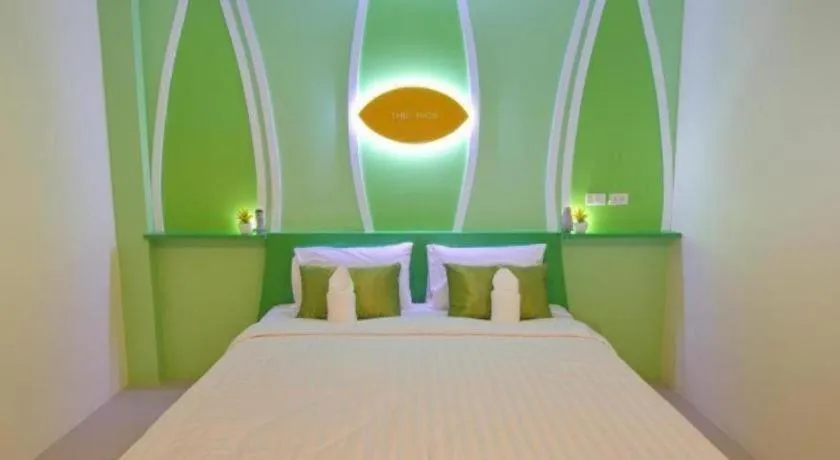 Bed in The Rice Hotel