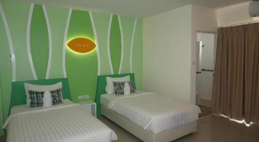 Bed in The Rice Hotel