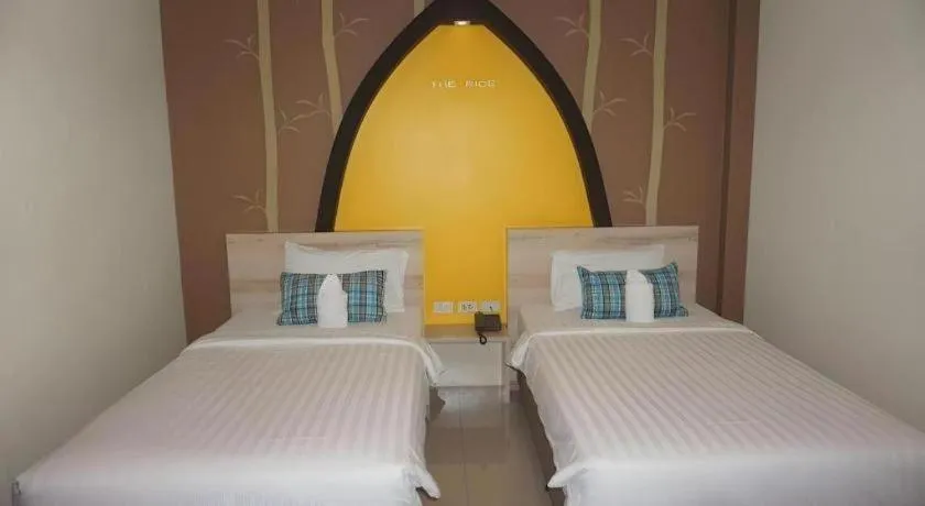 Bed in The Rice Hotel