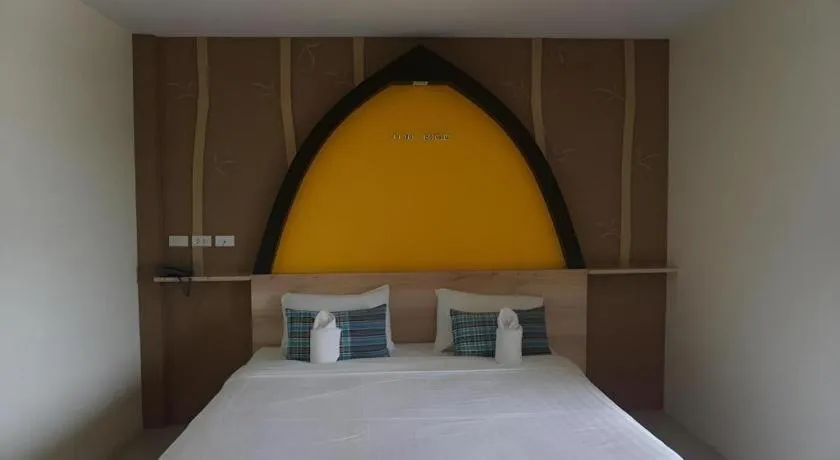 Bed in The Rice Hotel