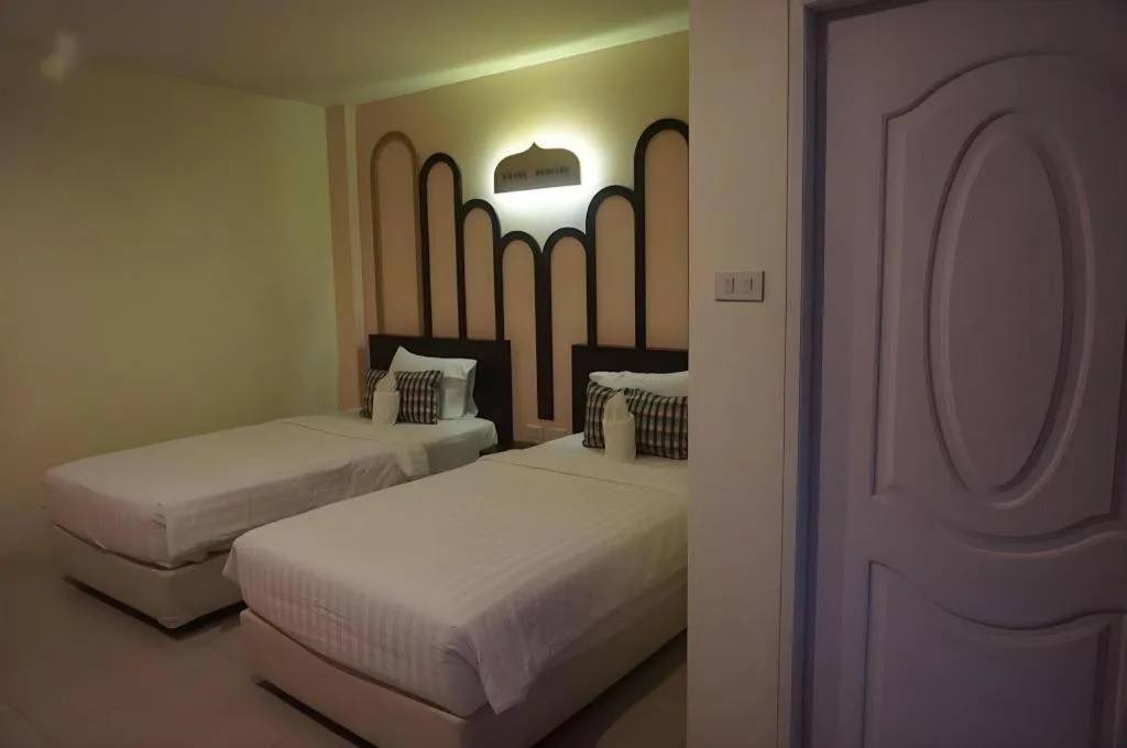 Bed in The Rice Hotel