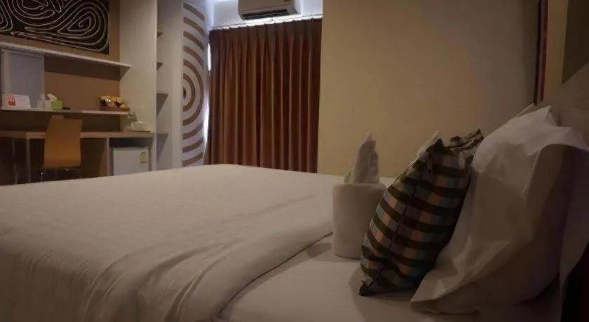 Bed in The Rice Hotel