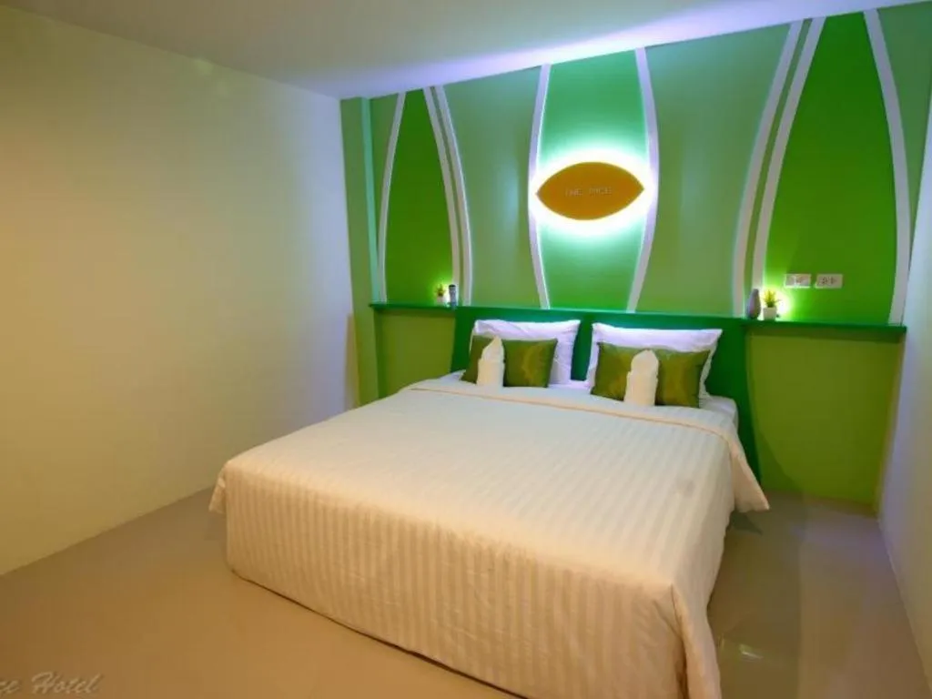 Bed in The Rice Hotel