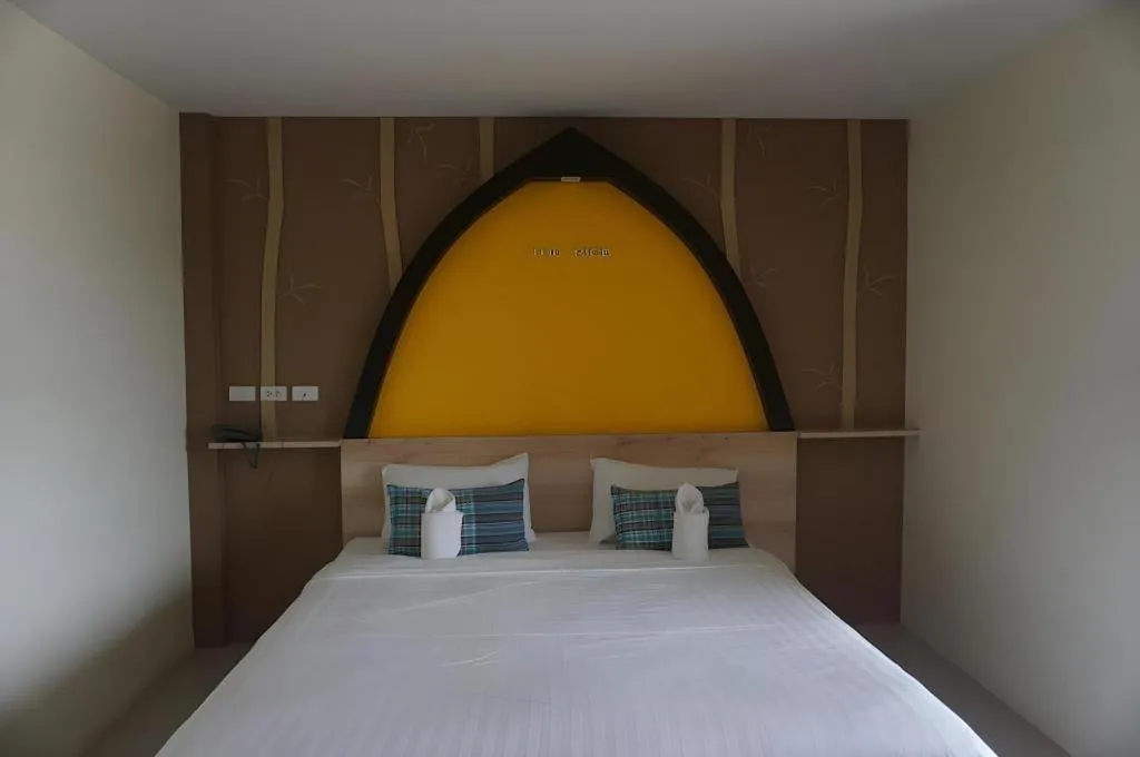 Bed in The Rice Hotel