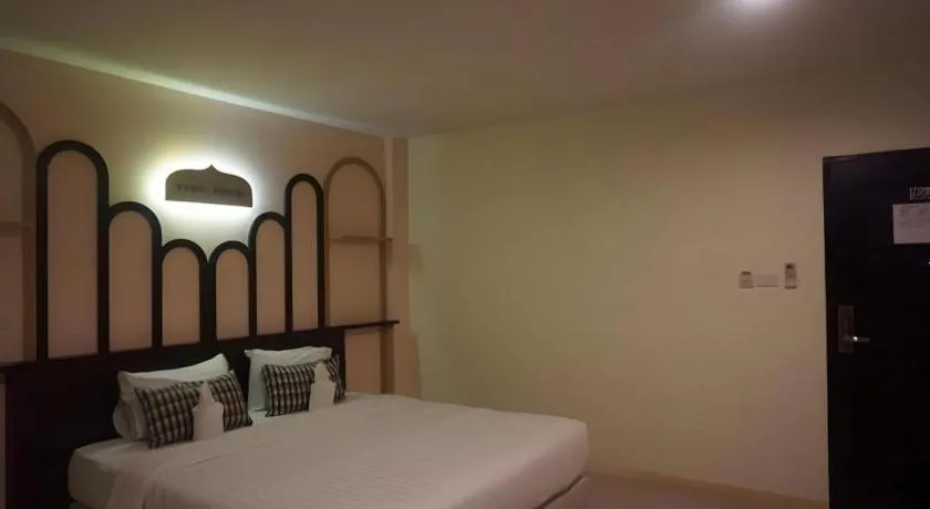 Bed in The Rice Hotel