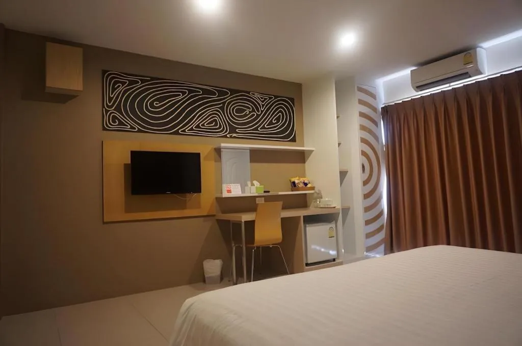 Bed in The Rice Hotel