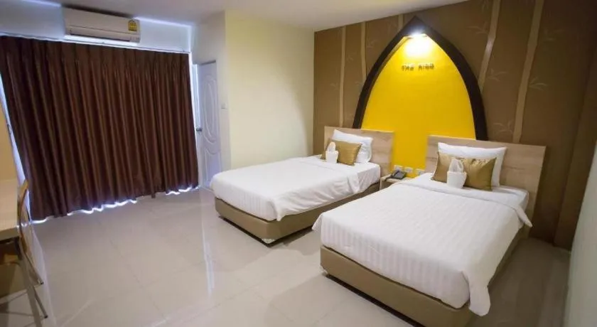 Bed in The Rice Hotel