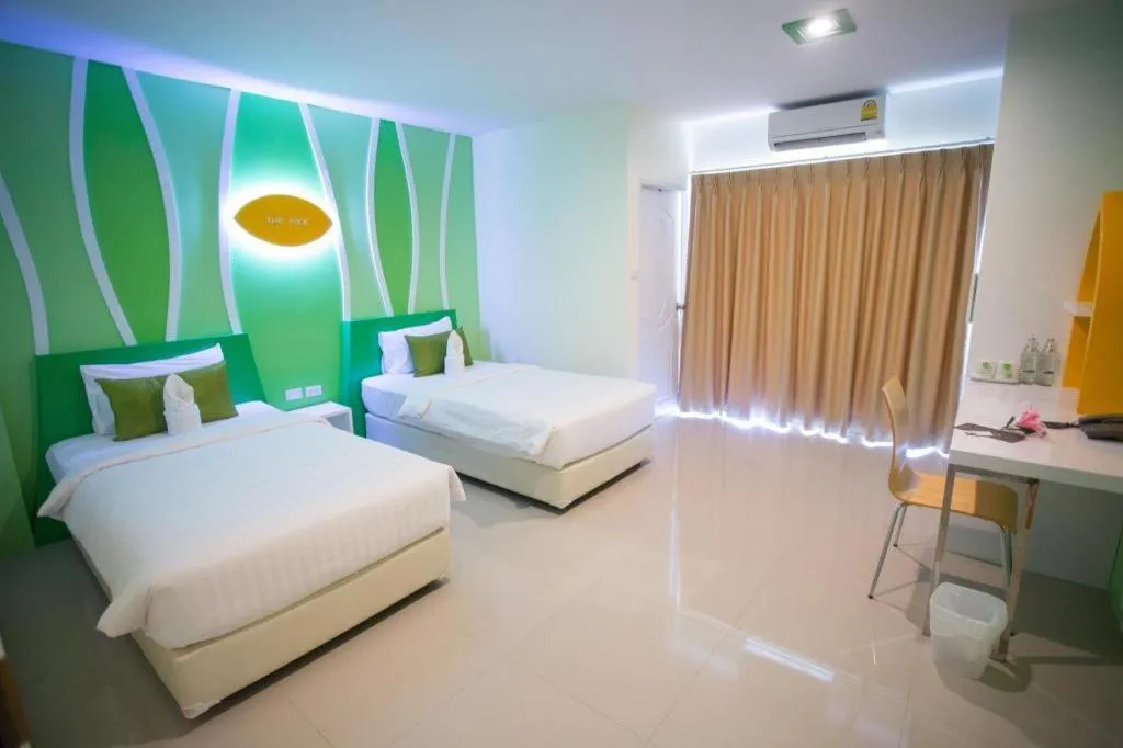 Bed in The Rice Hotel