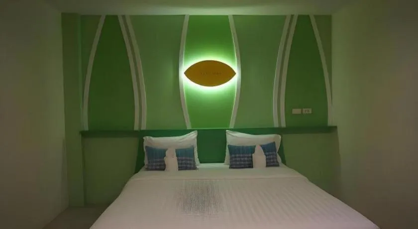 Bed in The Rice Hotel