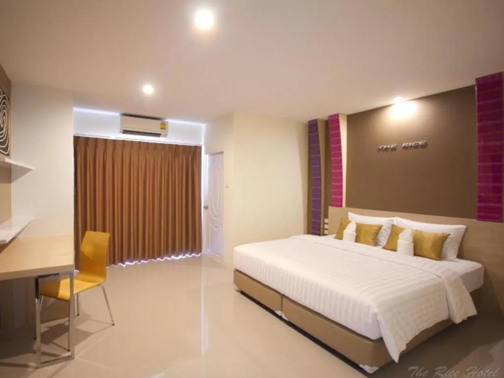 Bed in The Rice Hotel