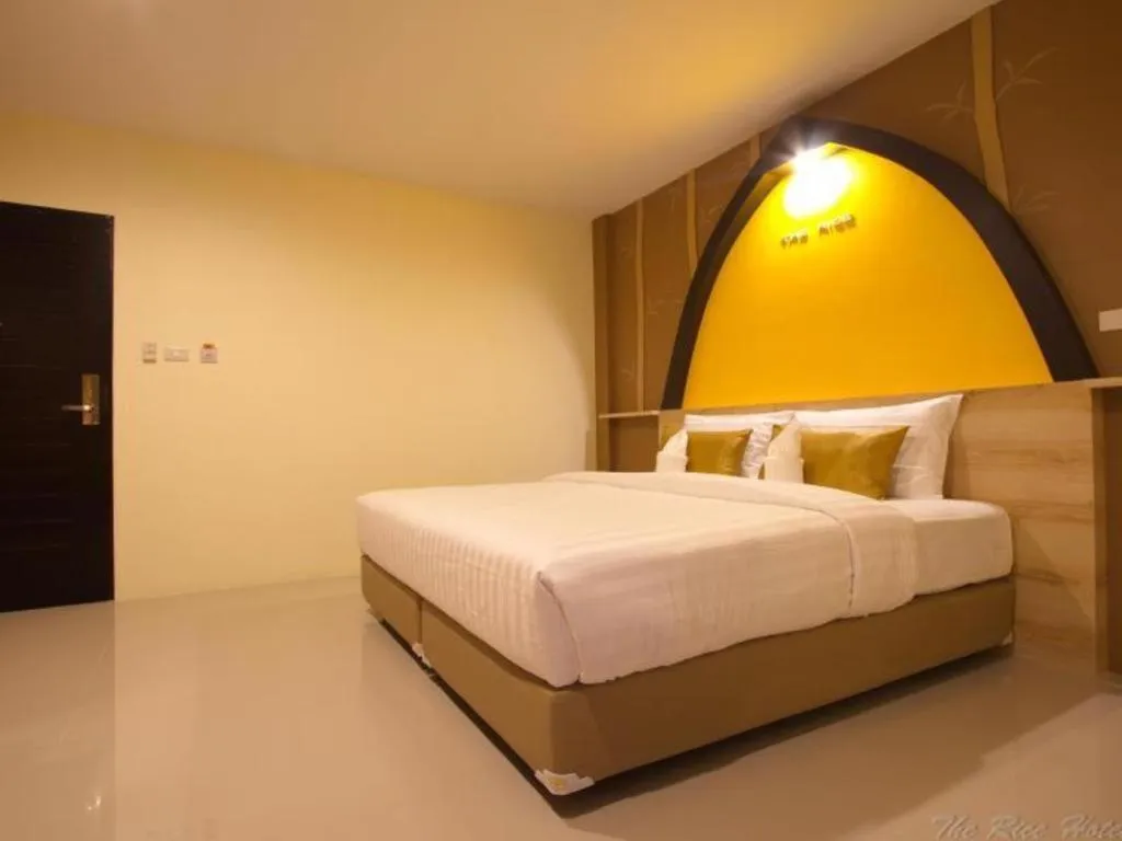 Bed in The Rice Hotel