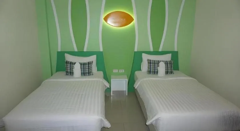 Bed in The Rice Hotel