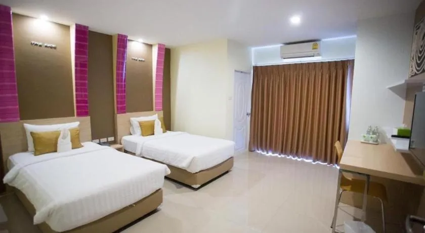 Bed in The Rice Hotel